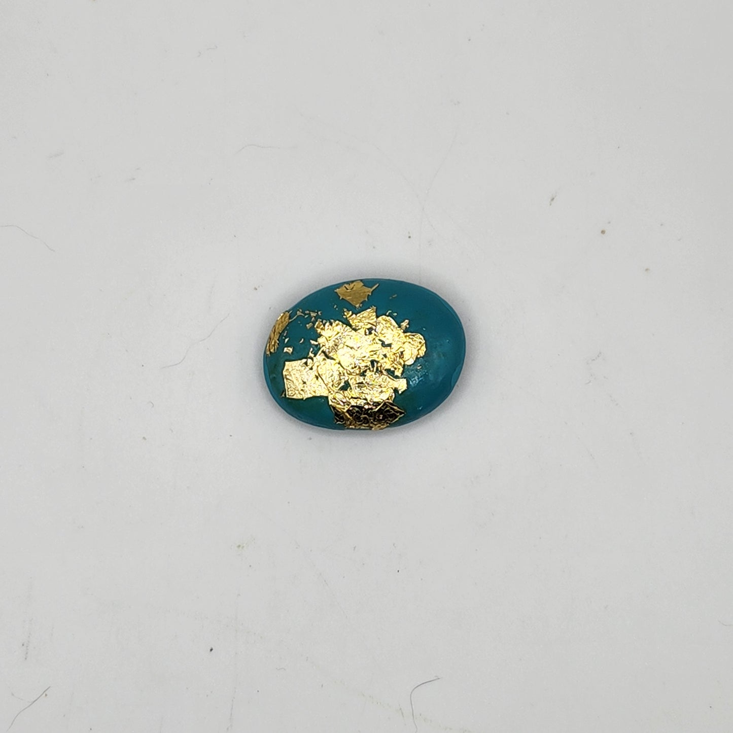 Pseudo turquoise with gold leaf garden stone