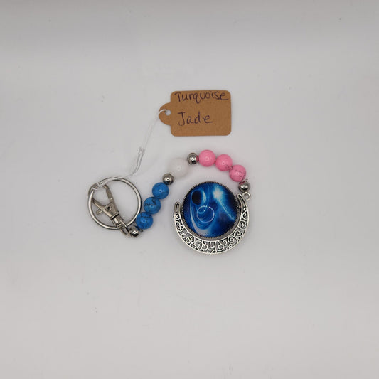 Pink and blue turquoise and white jade with saturn key-chain *glows in the dark*