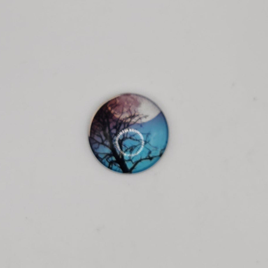 Tree silhouette with moon background magnet