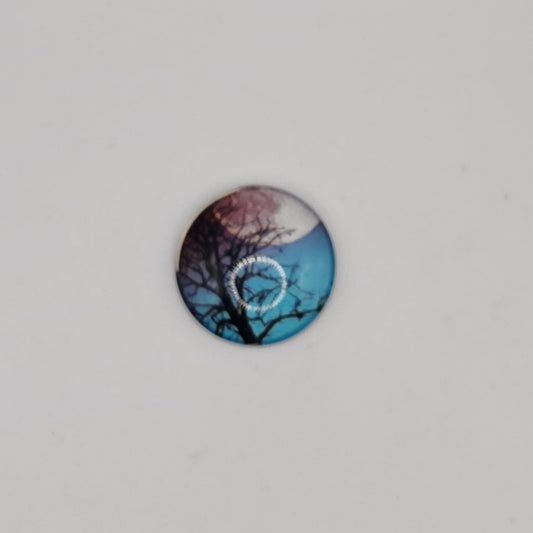 Tree silhouette with moon background magnet