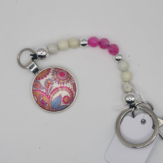 Sardonyx and jade with silverplated hematite featuring a paisley pendant