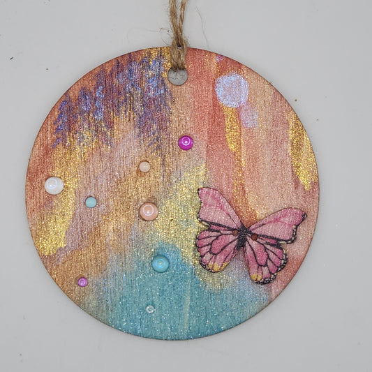 Pink butterfly with dew