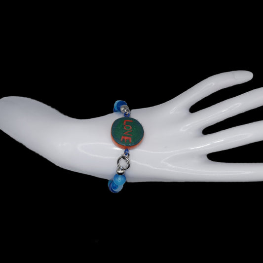 Love heart bracelet with charm M*Glows in blacklight/UV*