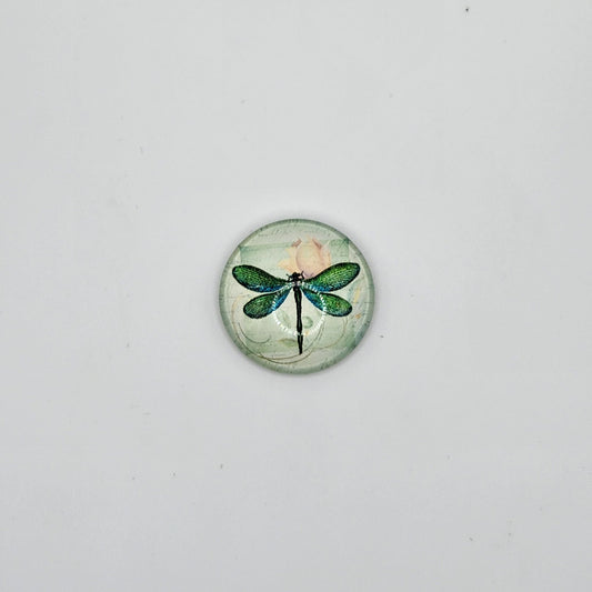Green dragonfly with pink flower refridgerator magnet
